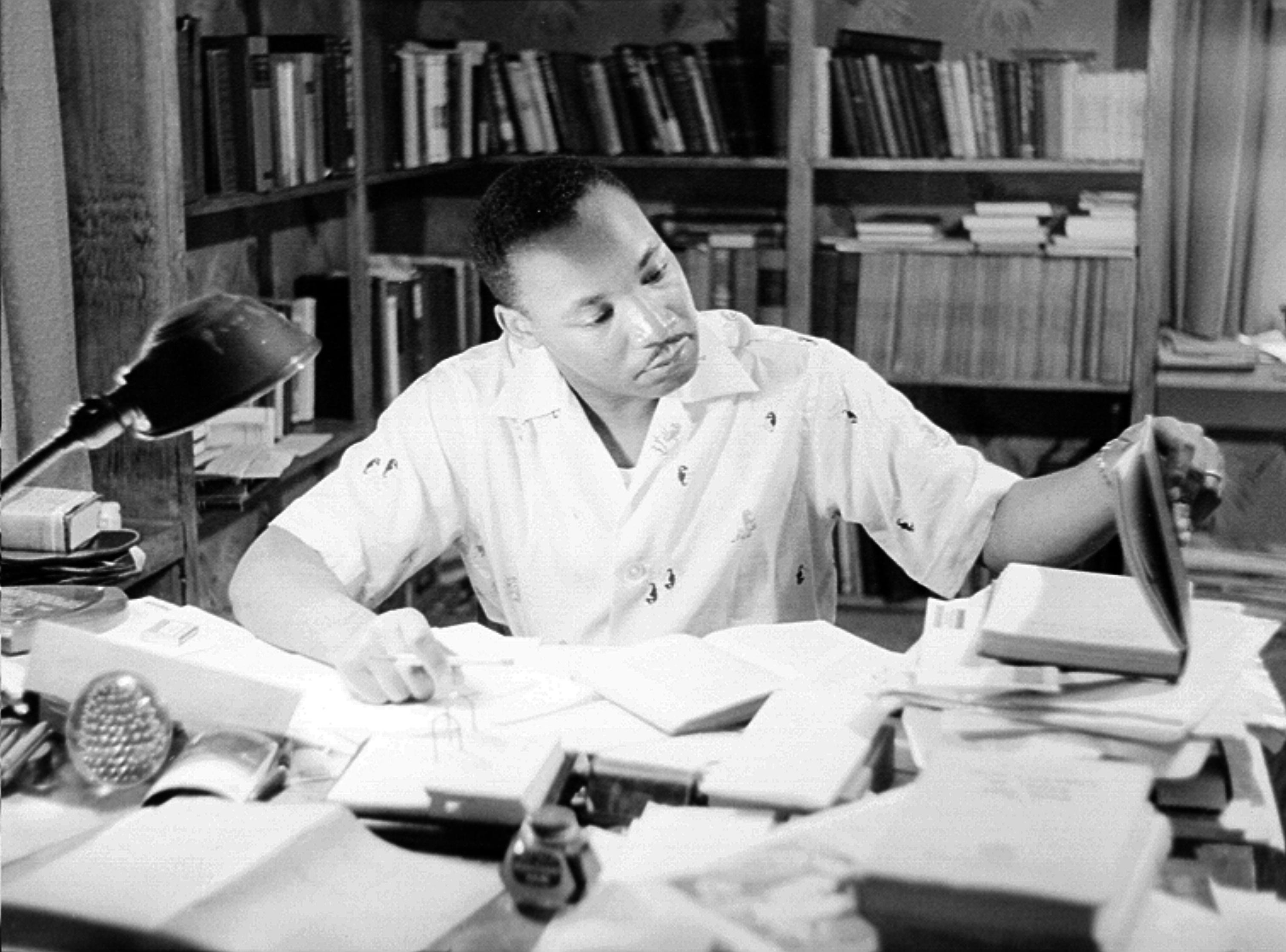 Martin Luther King, Jr. relaxes at home in May 1956.