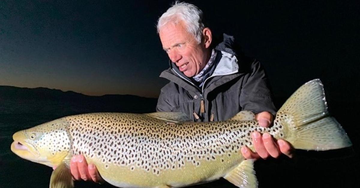 Jeremy Wade holding a brown trout.