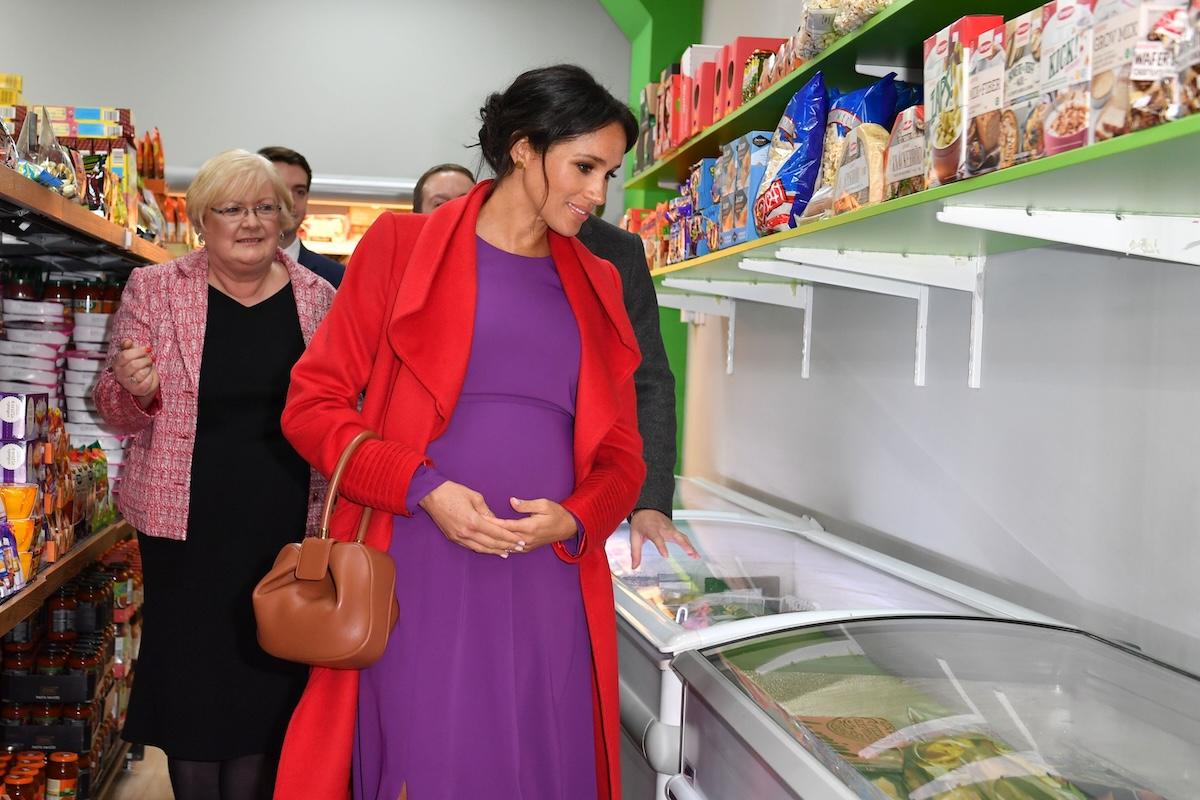 The Duke and Duchess of Sussex are shown around by manager Kay Penkethman as they officially open Number 7, a Feeding Birkenhead citizens supermarket and community cafe,