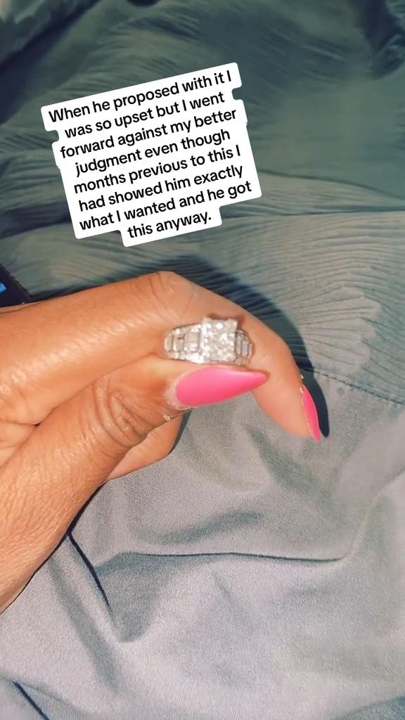 A TikTok user holding her diamond dust ring