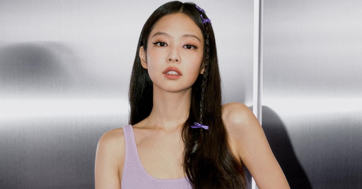 Jennie Kim from BLACKPINK poses in a lilac dress