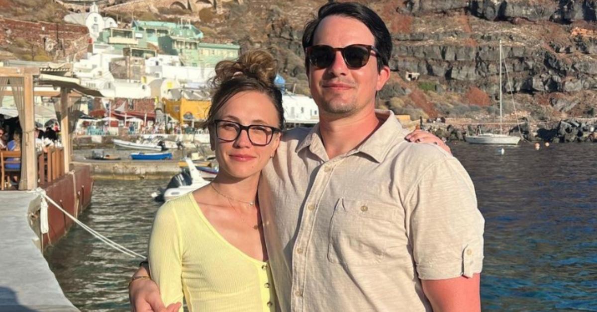 Kat Timpf with her husband Cam by the water.