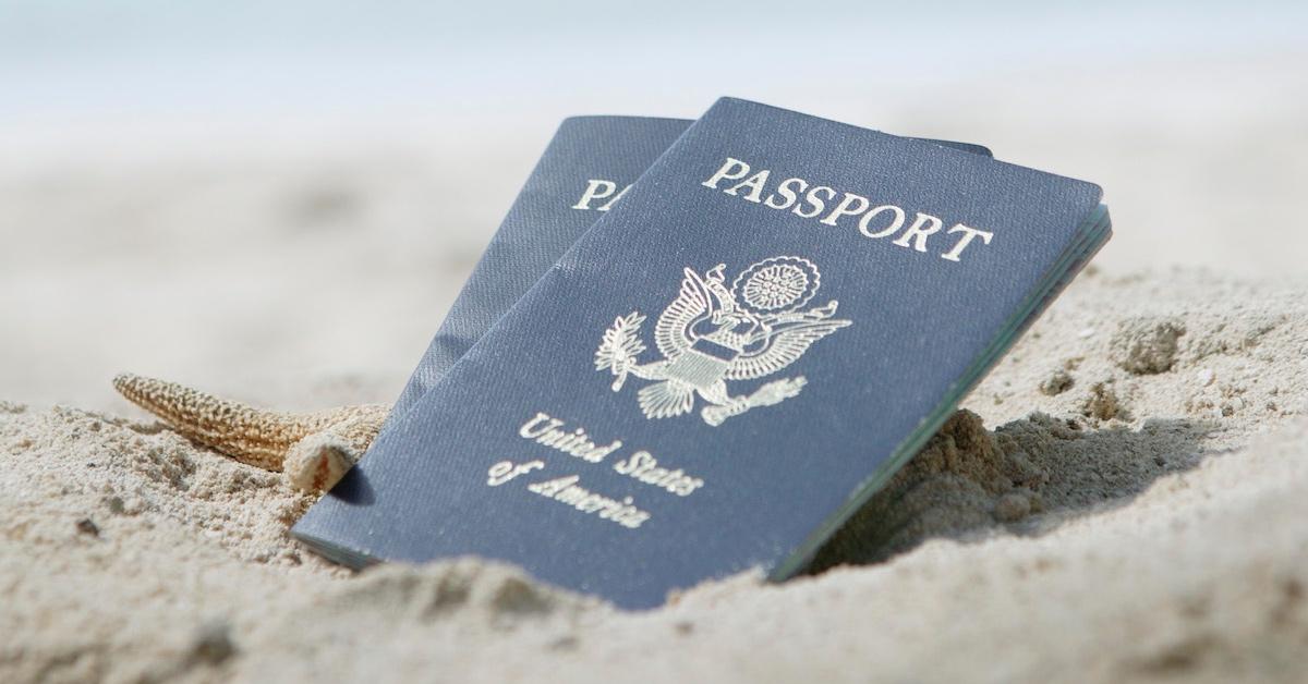 A set of passports in the sand