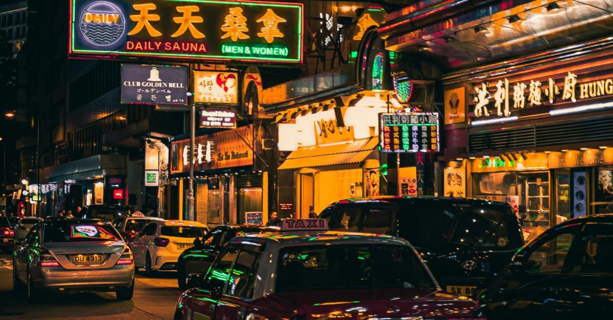 A lit up city street in China