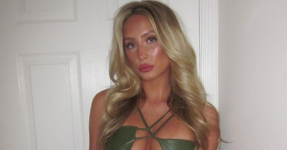 alix earle in a green crossover halter top