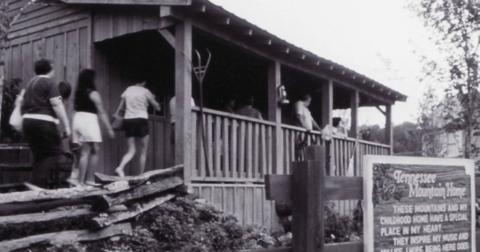 Fans enter the replica of Dolly Parton's childhood home at Dollywood