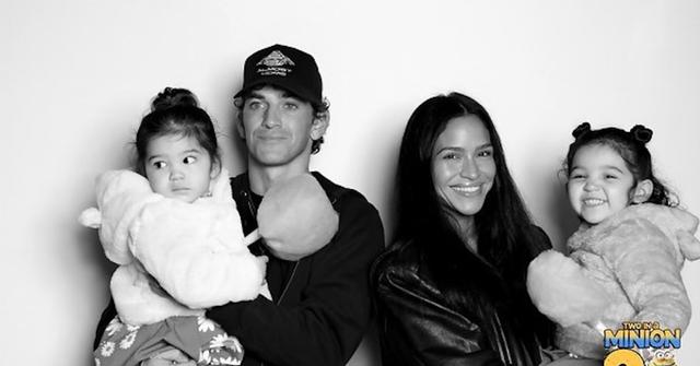 Alex Fine, Cassie, and their two daughters at birthday party