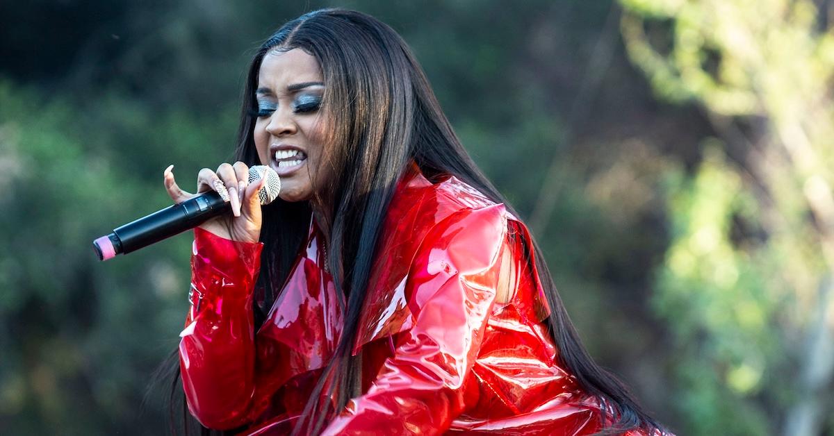 Stunna Girl performs in a red jacket at the Rose Fest in 2021