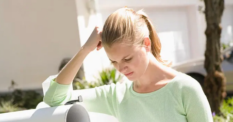 Woman Checking The Mail, frustrated