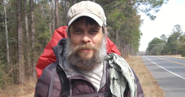 Vance Rodriguez dressed in hiking gear