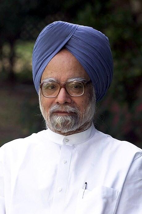 Manmohan Singh wearing white.