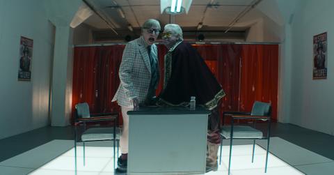 Mike Myers as Ken Scarborough, Richard McCabe as Exalted Pikeman Higgins in The Pentaverate.