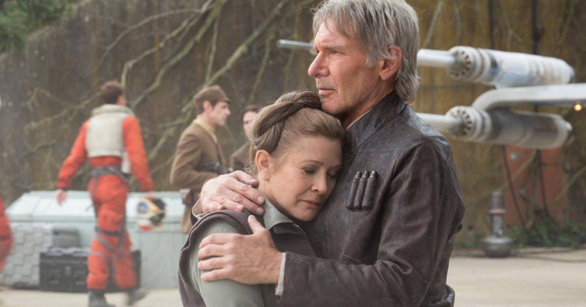 Han Solo (Harrison Ford) and Leia Organa (Carrie Fisher) reconcile in 'Star Wars: The Force Awakens.'