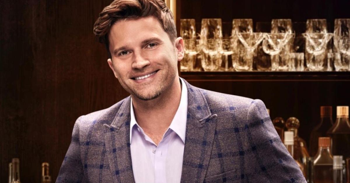 Tom Schwartz in front of a bar