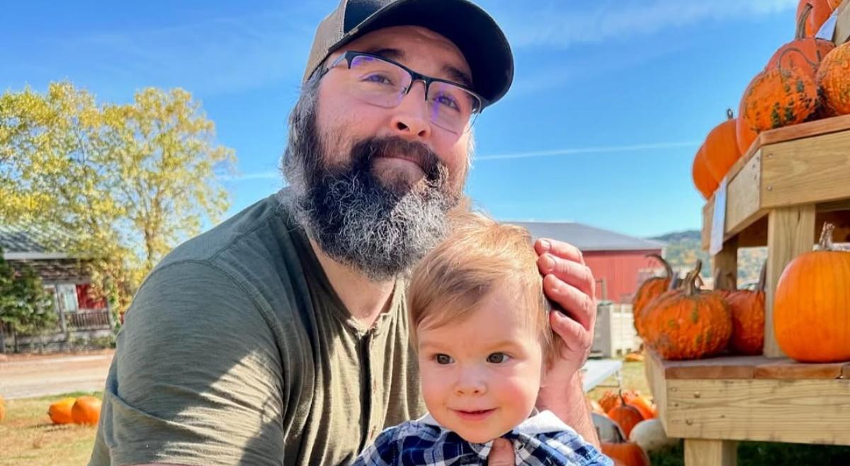 Aubry Bracco's husband and son at a pumpkin patch.
