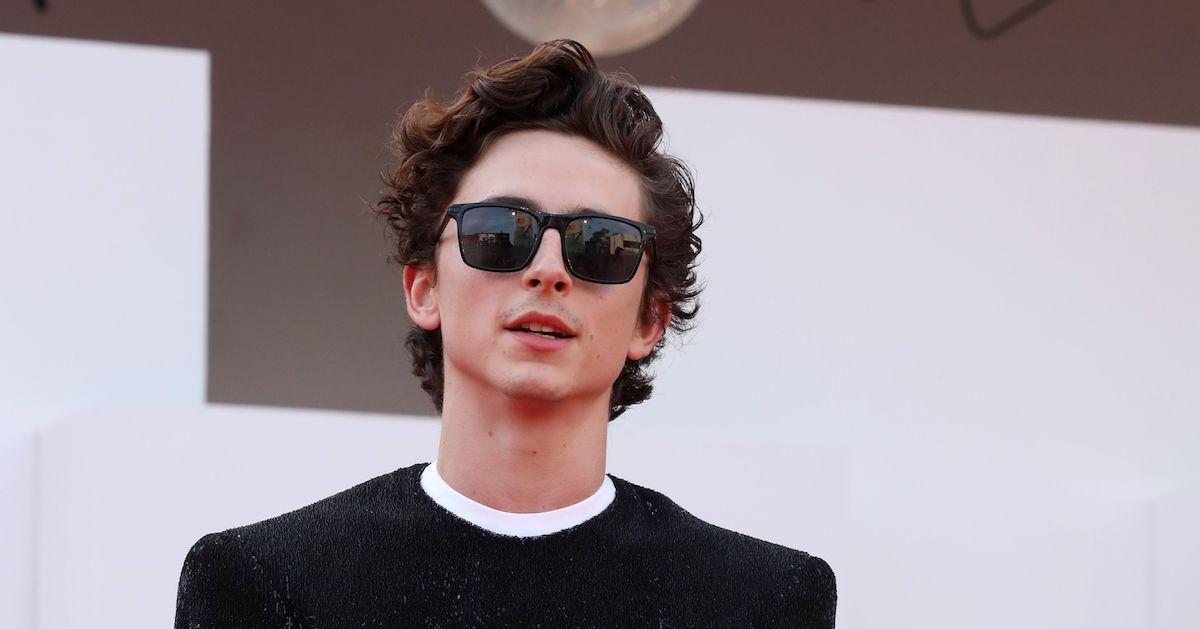 Timothée Chalamet attends a film premiere in sunglasses. 