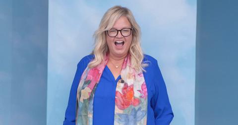 Angela Murray stands in a blue box with a blue shirt on Big Brother 26