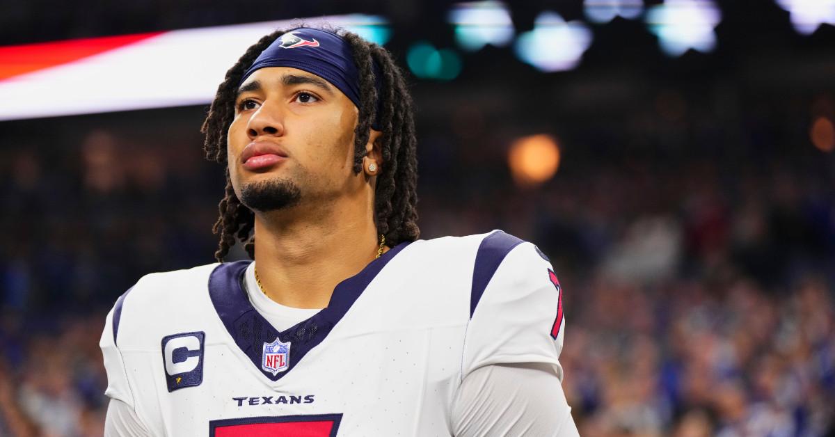 C.J. Stroud on the sideline in a Houston Texans uniform