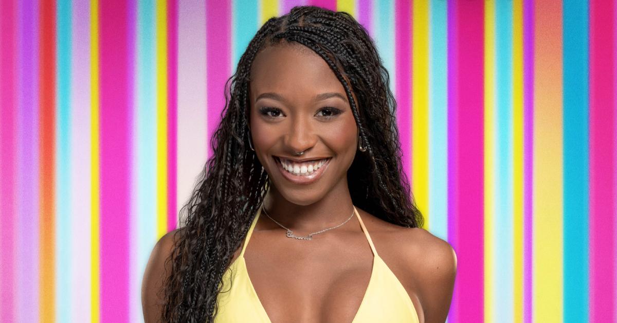 Serena Page poses in a yellow bikini for her official 'Love Island USA' Season 6 portrait.