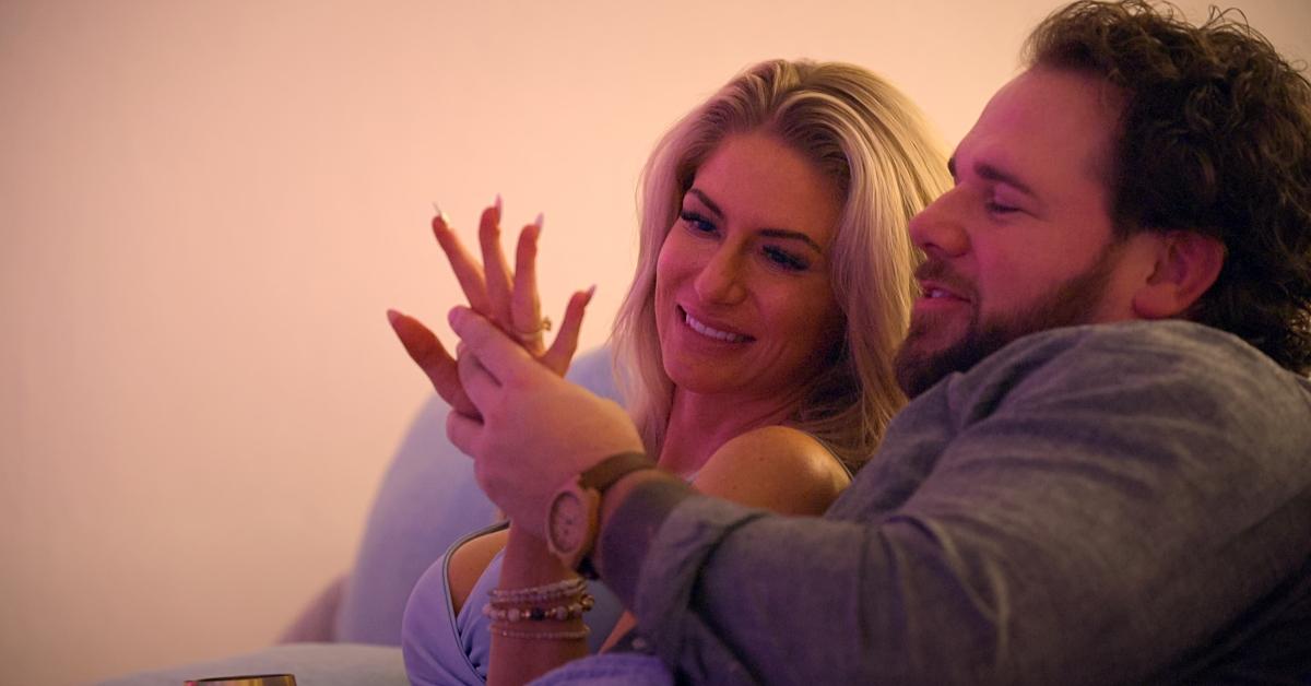 Amber and Jordan sitting on a couch