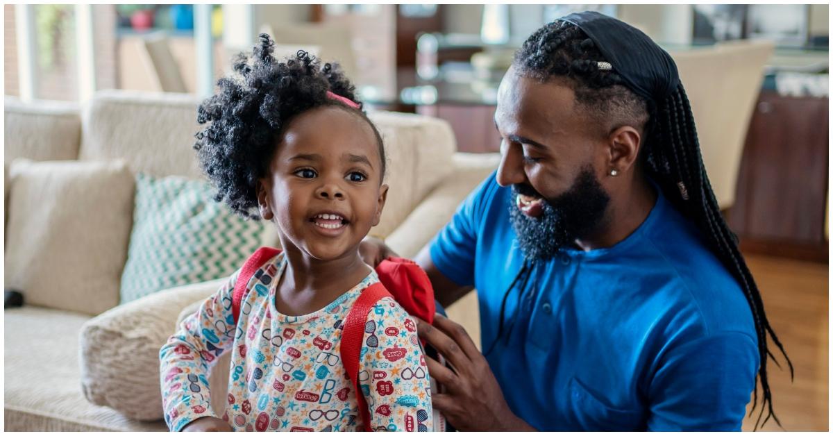 (l-r): A girl getting ready with her dad in the living room