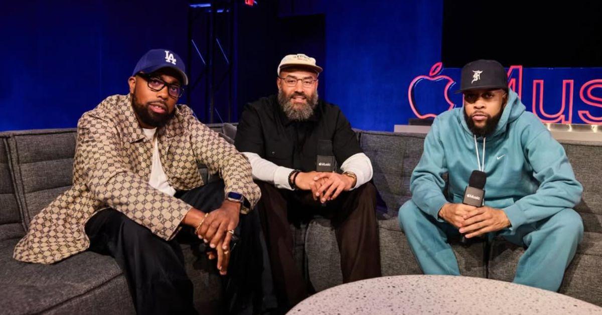 Ebro Darden with the co-hosts of 'Rap Life Review' sitting on a couch.