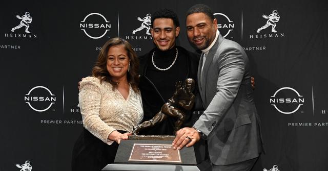 The 2021 Heisman Trophy Winner quarterback Bryce Young from Alabama and parents Julie and Craig Young.
