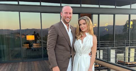 Brendan and Chloe Fitzpatrick standing on a wooden deck