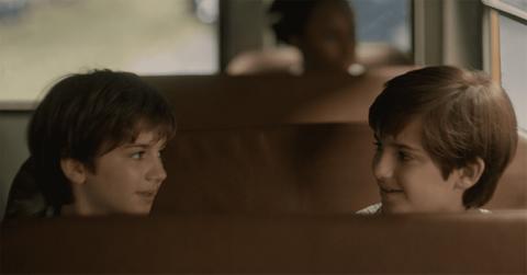 A young Adam and Danny on a bus in 'The Crowded Room.'