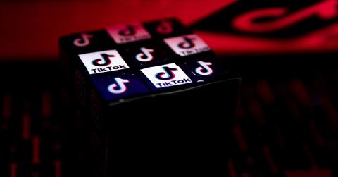 A series of TikTok logo on a cube.