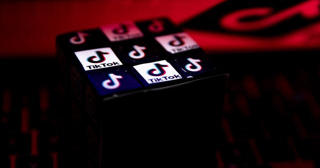 A series of TikTok logo on a cube.