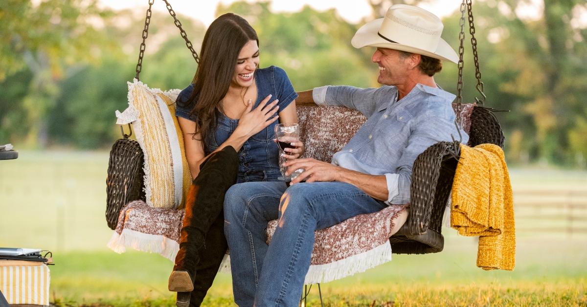 Ty and Melody on a swing together on Farmer Wants a Wife