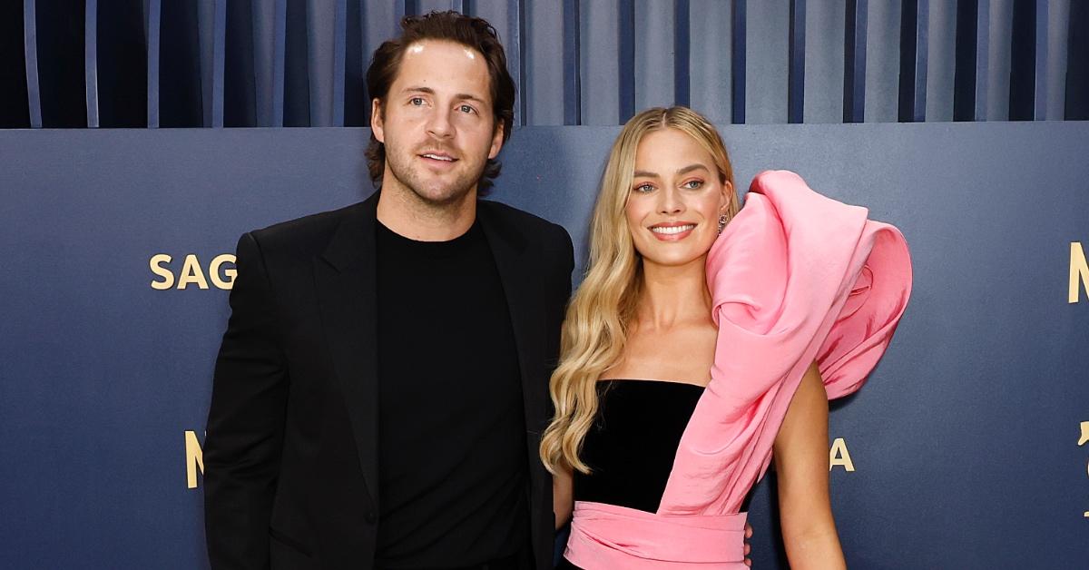 Margot Robbie and husband arriving on the red carpet at the 30th Screen Actors Guild Awards in Shrine Auditorium and Expo Hall.