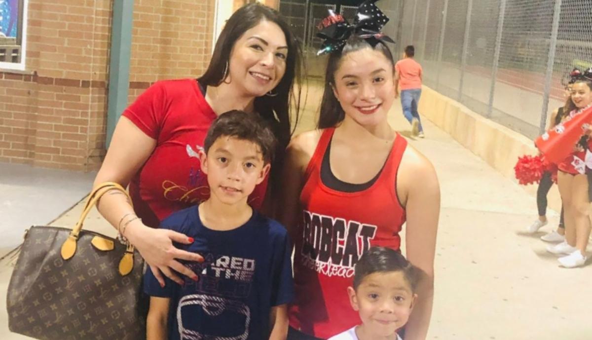 Brianna Aguilera (R) with her mother (L) and two brothers