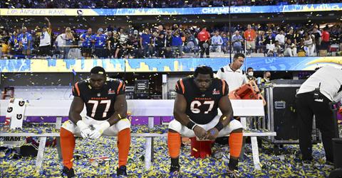 Cincinnati Bengals Hakeem Adeniji (77) and Trey Hopkins (67) after losing Super Bowl LVI against the Los Angeles Rams on Feb. 13, 2022