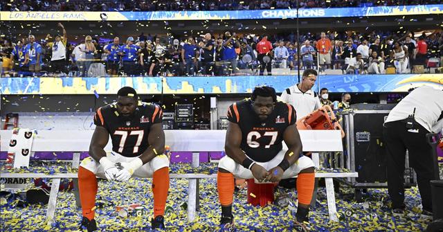 Cincinnati Bengals Hakeem Adeniji (77) and Trey Hopkins (67) after losing Super Bowl LVI against the Los Angeles Rams on Feb. 13, 2022