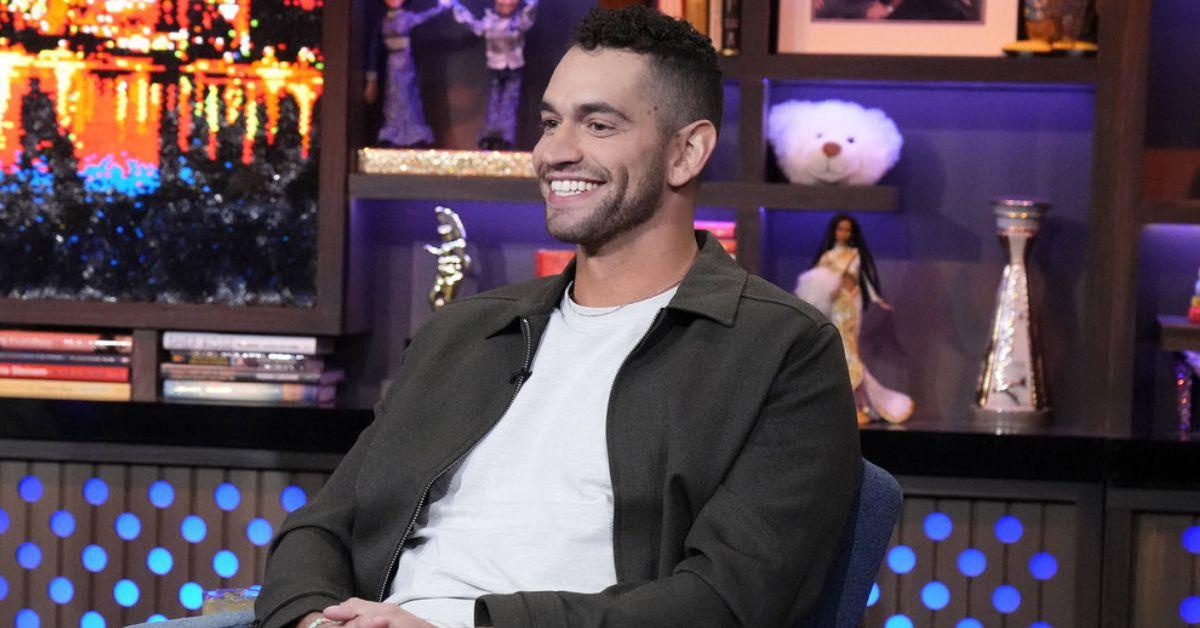 Jesse Solomon seated and smiling on 'WWHL'