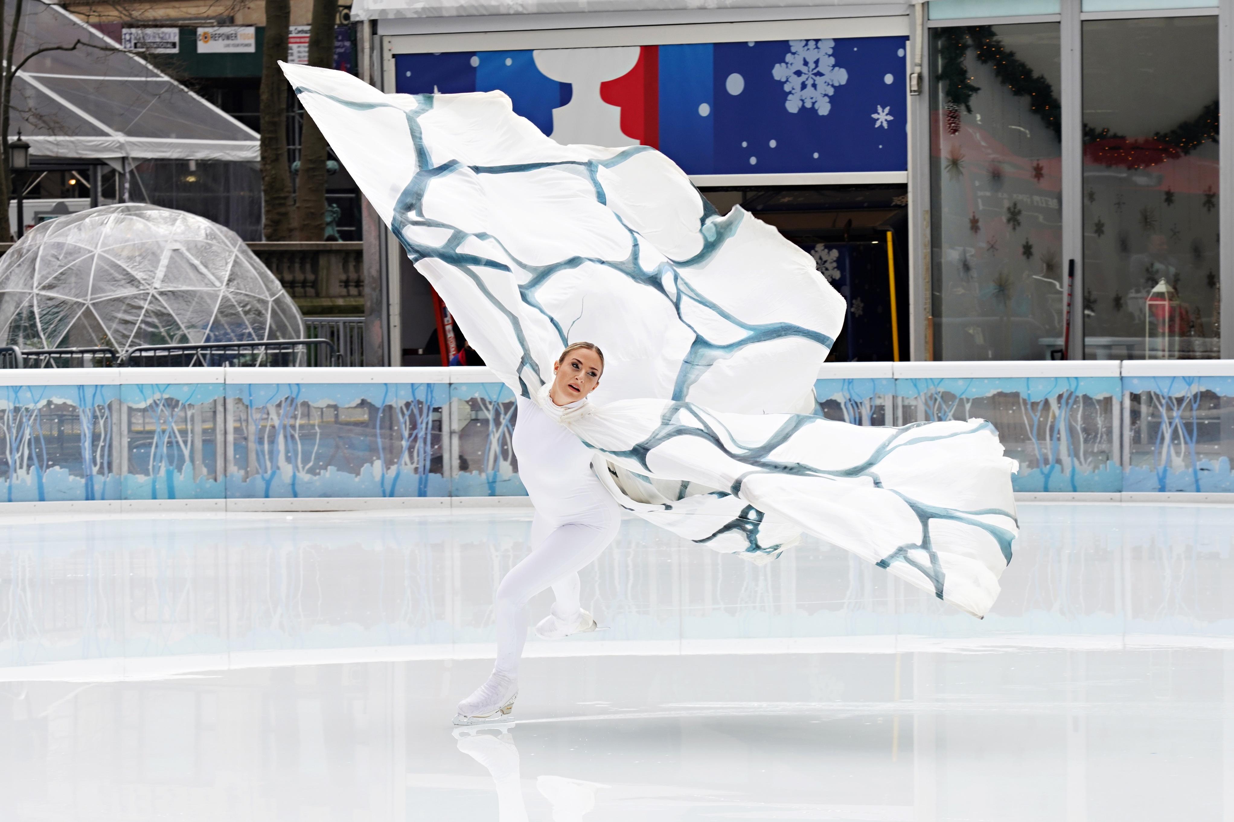 Figure skater competes at an outdoor event.