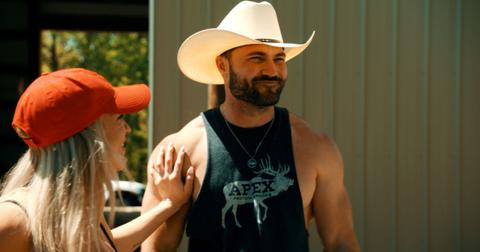 Steven Jr. McBee smiles as his girlfriend, Calah, places her hand on his arm.