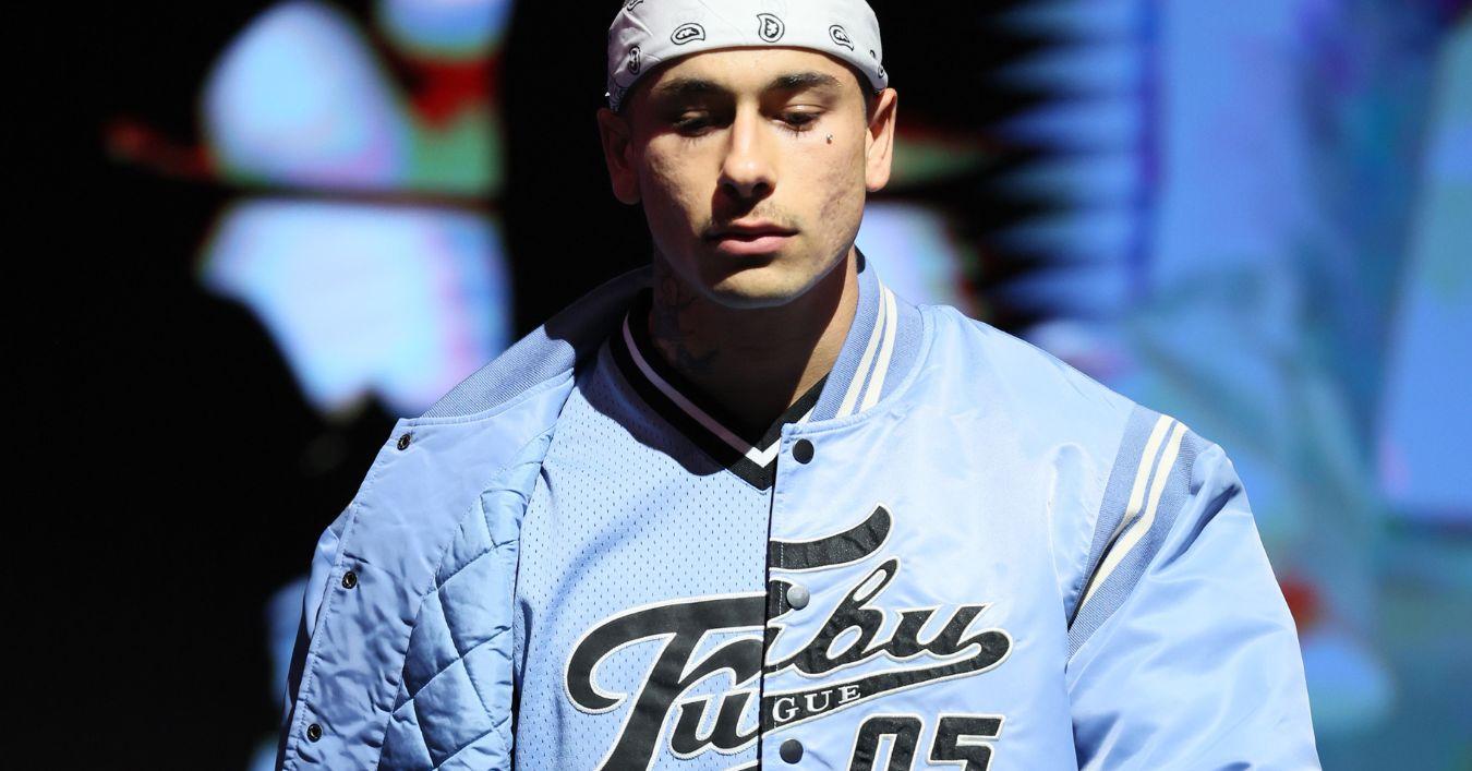  A model walks the runway wearing FUBU during the Universal Hip Hop Museum's "The Drip: 50 Years of Hip Hop Fashion" at Hard Rock Hotel New York on February 24, 2023 in New York City