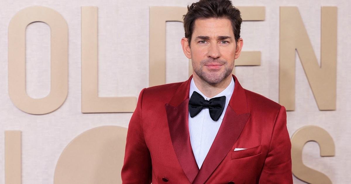 John Krasinski poses for a press photo