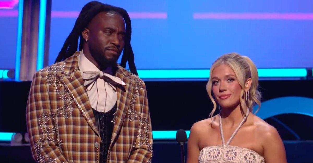 Shaboozey gives Megan Moroney the side-eye during AMAs.