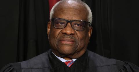 United States Supreme Court Associate Justice Clarence Thomas poses for an official portrait