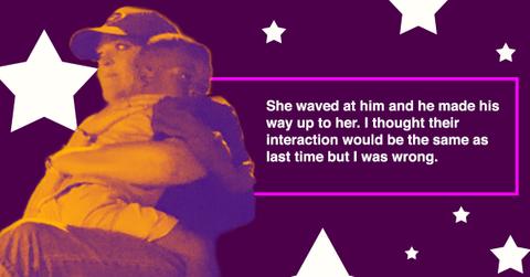 woman hugs boy football game