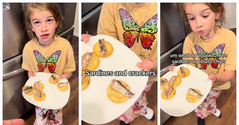 Teagan eats sardines