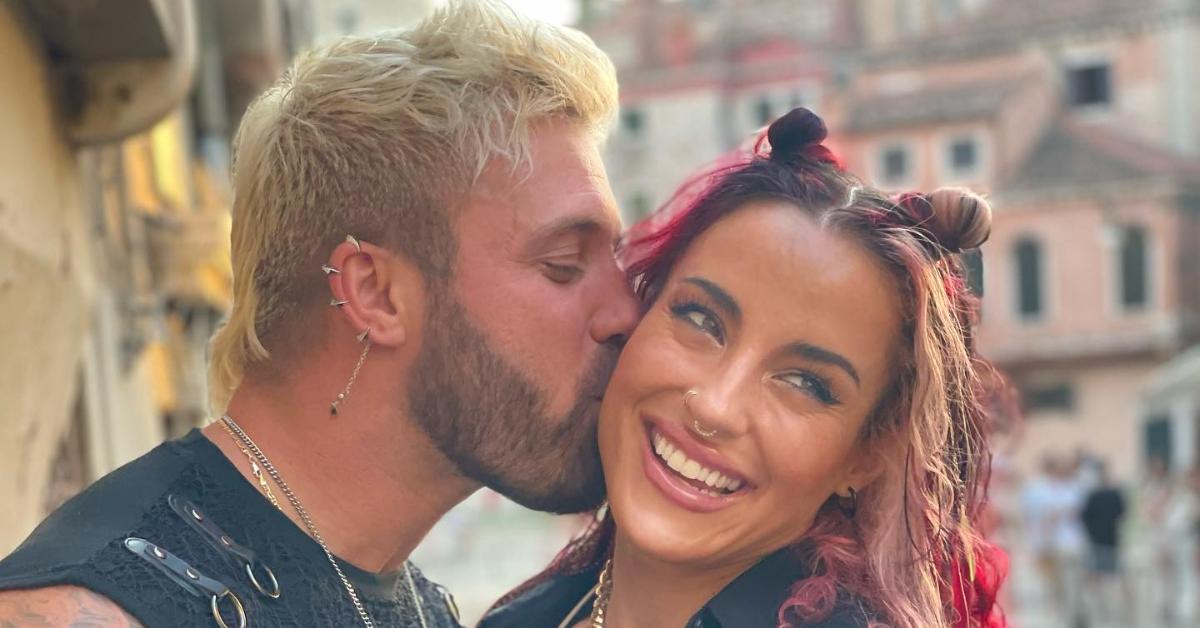 Paulie Calafiore kisses Cara Maria Sorbello's cheek during a trip to Italy.