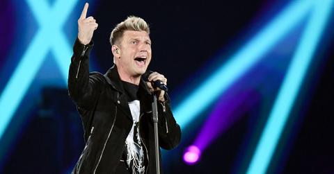 Nick Carter singing on stage