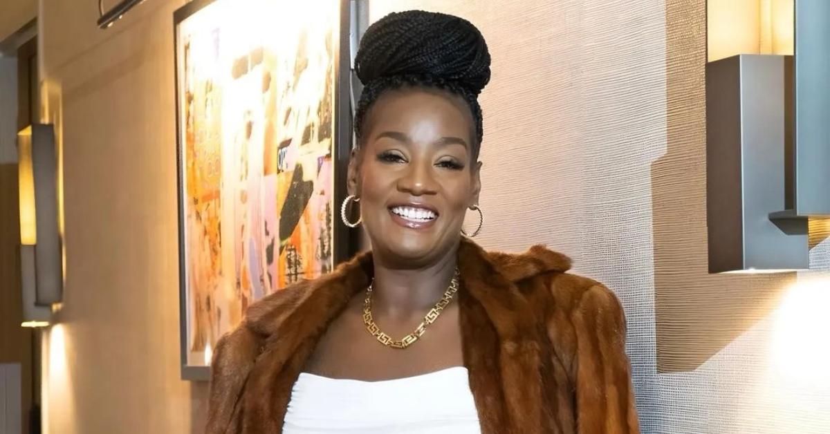 Cirie Fields smiling and wearing a fur coat