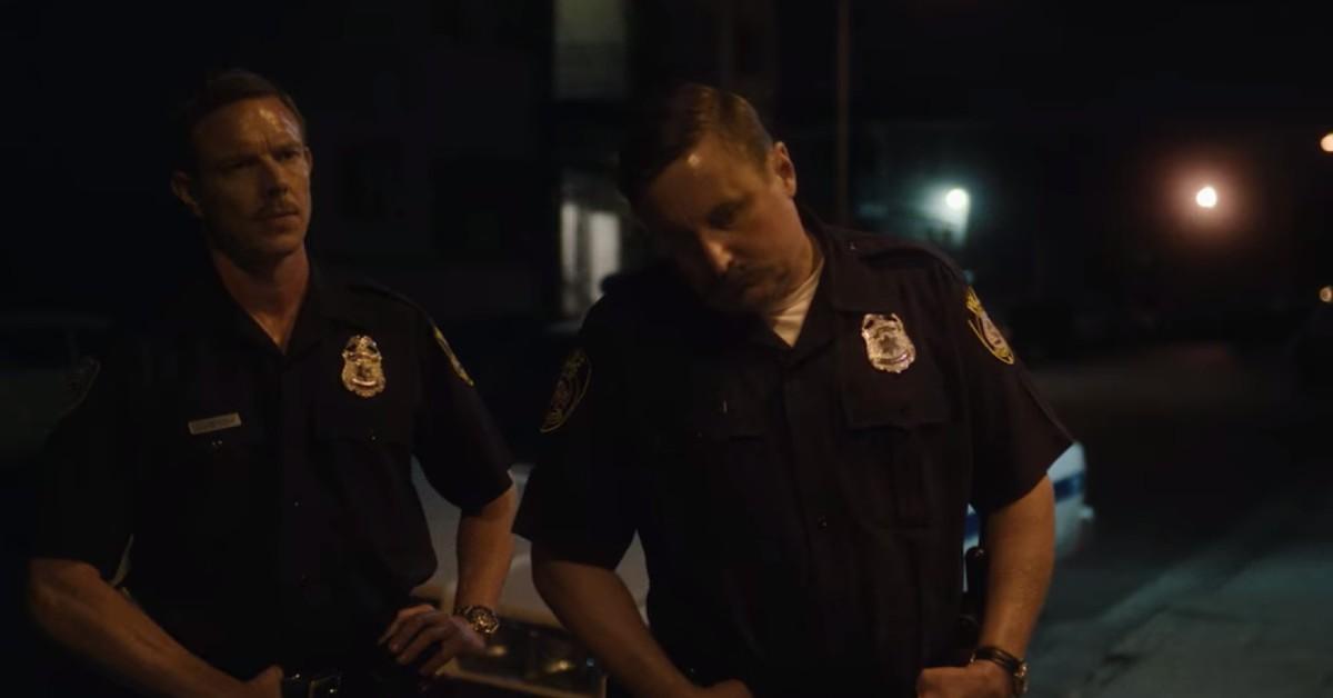 (L-R) Officer Gabrish (Matthew Alan) and Officer Balcerzak (Scott Michael Morgan)