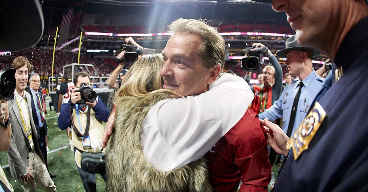 Nick Saban hugging his daughter Kristen after the 2018 college football championships. 